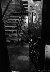 Graffiti and stairway in parking garage.