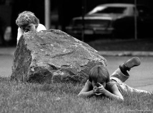 Two kids playing with guns outside our apartment. Kris Maxfield, 11, left, and Erik Finn, 8
