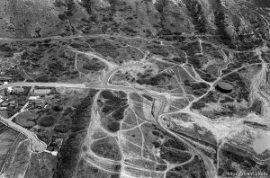 damage caused to watershed hills from motorcycles, etc. shot from a plane..