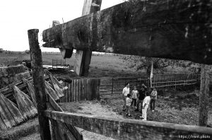 Family and funnel cloud/tornado damage to their farm.
