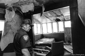 Eureka Police Chief Fullmer checks out an abandoned house.