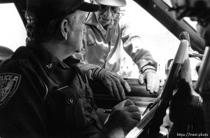 Earl tells Eureka Police Chief Fullmer of a missing child.