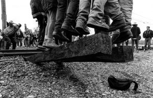 War protesters rip up train tracks at the Naval Weapons Station at Gulf War protest