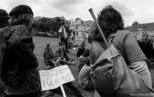 Guy with baseball bat at anti-racist skinhead rally