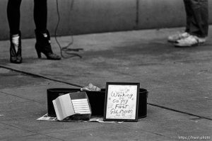 Singer's feet and sign 