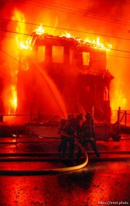 House burns with fire on the night of the Rodney King Riots.