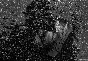 couple's dance photo with girl ripped out.