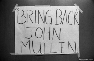 Signs and petition supporting John Mullen