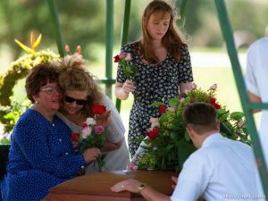 Family mourns at funeral for Jennifer Neddo, killed by drunk driver.