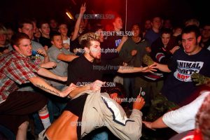straightedge pit at Godflesh. went into a frenzy after a longhair they had been picking on was thrown out of the club. Kevin Clark at right with camo gloves.