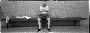 Elwood Liedtke, a 30-year member of the Deseret Gym, sits on a poolside bench. 