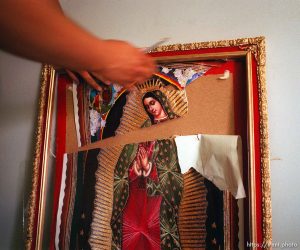 A painting of the Virgin of Guadalupe which police allegedly ruined at Panaderia La Diana tortilla factory, which was raided by 75 cops in April on a false drug tip.