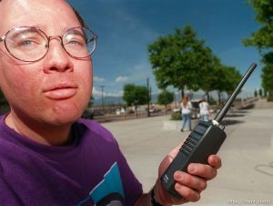 Guy with scanner at Apex shoes' promotion when Karl Malone won the NBA MVP award. They had the 