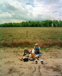 Handcart walkers Mike Dunn (CA) and Nancy Adams (CO) rest during a lunch break on the Mormon Trail Wagon Train.