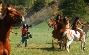 Steadi Cam operator Andrew Mitchell (pink shirt) while filming of the movie 