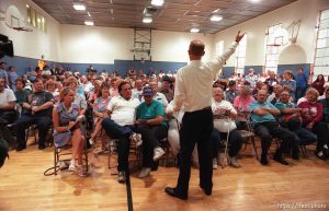 Steve Heidt addresses trailer park residents at a meeting to complain about a new law that allows park owners to evict tenants with no reason.