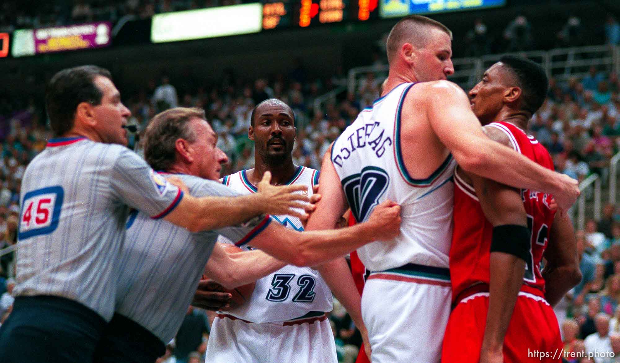 Utah's Greg Ostertag goes after Chicago's Scottie Pippen after knocking him to the floor at the NBA Finals Game four, Utah Jazz vs Chicago Bulls.