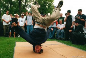 Bryan Montague breakdances to the beats of local hip-hop group 360° at the 