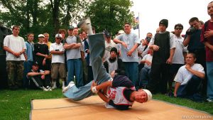 Nestor Medina breakdances to the beats of local hip-hop group 360° at the 