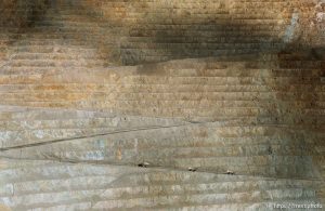 240-ton haul trucks bring rock out of the Bingham Copper Mine, owned by Kennecott