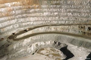 240-ton haul trucks bring rock out of the Bingham Copper Mine, owned by Kennecott
