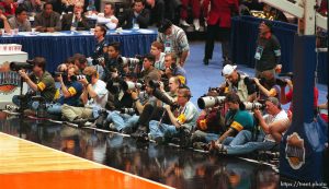 Still photographers at the Final Four. 