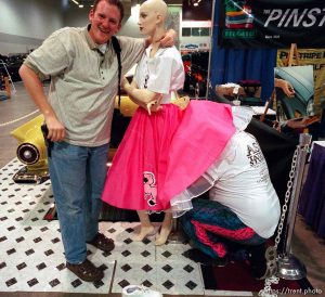 Ryan Galbraith and Don Brouse sets up a mannequin next to his '57 Thunderbird at the 24th annual Parts Plus Autorama, held at the Salt Palace Convention Center.