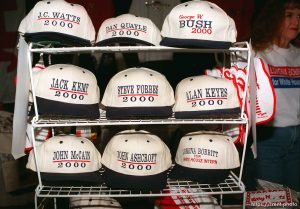Republican campaign caps, one says 