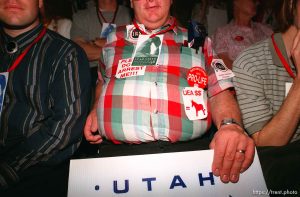 Delegate with stickers and signs at the Utah State Republican Party Convention, held at Utah Valley State College.