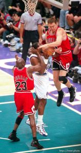 Luc Longley and Michael Jordan pressure Karl Malone at Jazz vs. Bulls, game 6 of the NBA Finals. Bulls won