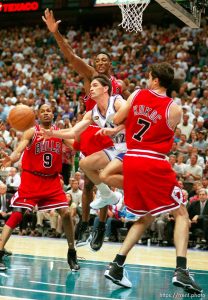 John Stockton passes in traffic at Jazz vs. Bulls game 2, NBA Finals. Bulls won.
