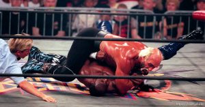 Karl Malone and Hollywood Hulk Hogan wrestle at WCW's Bash at the Beach.