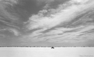 Cars and RV's lined up at the Bonneville Salt Flats to watch Speed Week.