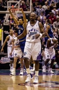 Karl Malone walks off the court after missing the last shot, giving Dallas the series victory. as the Utah Jazz face the Dallas Mavericks in game five of their first round playoff series, in Salt Lake City Thursday.  05/03/2001