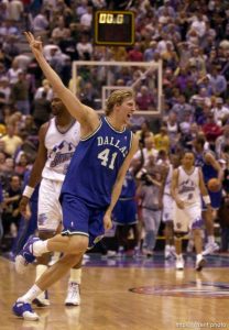 Dirk Nowitzki celebrates victory as the Utah Jazz face the Dallas Mavericks in game five of their first round playoff series, in Salt Lake City Thursday.  05/03/2001
