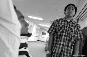 Emotionally overcome during a hospital visit is Steven Vaenuku, a teammate of Una's on the West High School football team. West High football player Una Taufa suffered a severe neck injury in a game two weeks ago and is partially paralyzed. He has begun the long and arduous rehabilitation process at LDS Hospital. . 09/27/2001, 11:50:50 AM