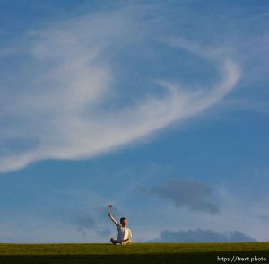 Scott Kroft , 8, waves a flag at a ceremony in Sugarhouse Park Friday night to celebrate the return of Utah Task Force One, the Urban Search and Rescue Team which spent about a week in New York City at ground zero of the World Trade Center. 09/28/2001, 6:36:31 PM