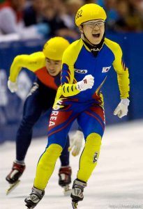 Korea's Seung-Jae Lee celebrates first place in 500 meter semifinal rounds, Short Track Olympic Qualifier at the Delta Center Friday night. . 10/26/2001, 8:17:32 PM