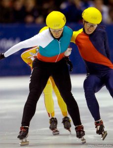 China's Yang Yang (A), right, tries to get ahead of Bulgaria's Evgenia Radanova as they cross the finish line of the 500 meter finals, Short Track Olympic Qualifier at the Delta Center Friday night. Radanova, the world record holder, took first place in the final. . 10/26/2001, 8:37:06 PM