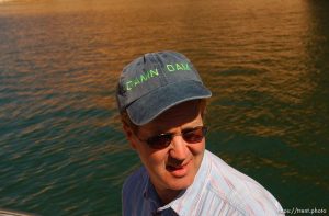 Wearing a hat labelled 