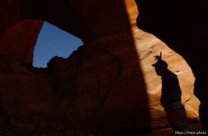 Richard Ingebretsen, founder and president of the Glen Canyon Institute, speaks to journalists under the LaGorce arch in Davis Gulch on a trip on Lake Powell. Landmarks which had previously been submerged in Glen Canyon are now becoming visible with the lower water levels in Lake Powell.
