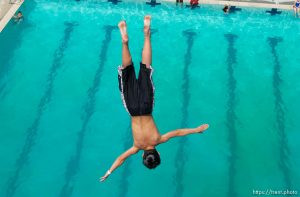 Leaping off the ten meter platform at the Kearns Oquirrh Park Fitness Center in Kearns Wednesday afternoon.