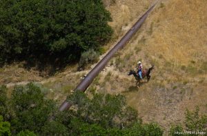 The search continues on horseback Tuesday afternoon in Salt Lake City's Memory Grove for jogger Lori Hacking, who went for a run in the park Monday morning and disappeared.