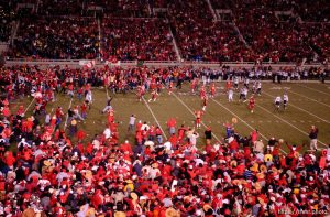 fans swarm the field. Utah vs. BYU college football. 11.20.2004