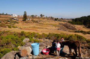 Maria Archero de Hernandez (with heart/flag shirt) and children; 12.02.2004