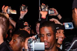 players with videocameras. The Utah football team and their Fiesta Bowl appearance was the focus of a large pep rally was held Thursday evening at the Point South Mountain Resort. A large crowd of Utah fans was joined by the school band and cheerleaders.