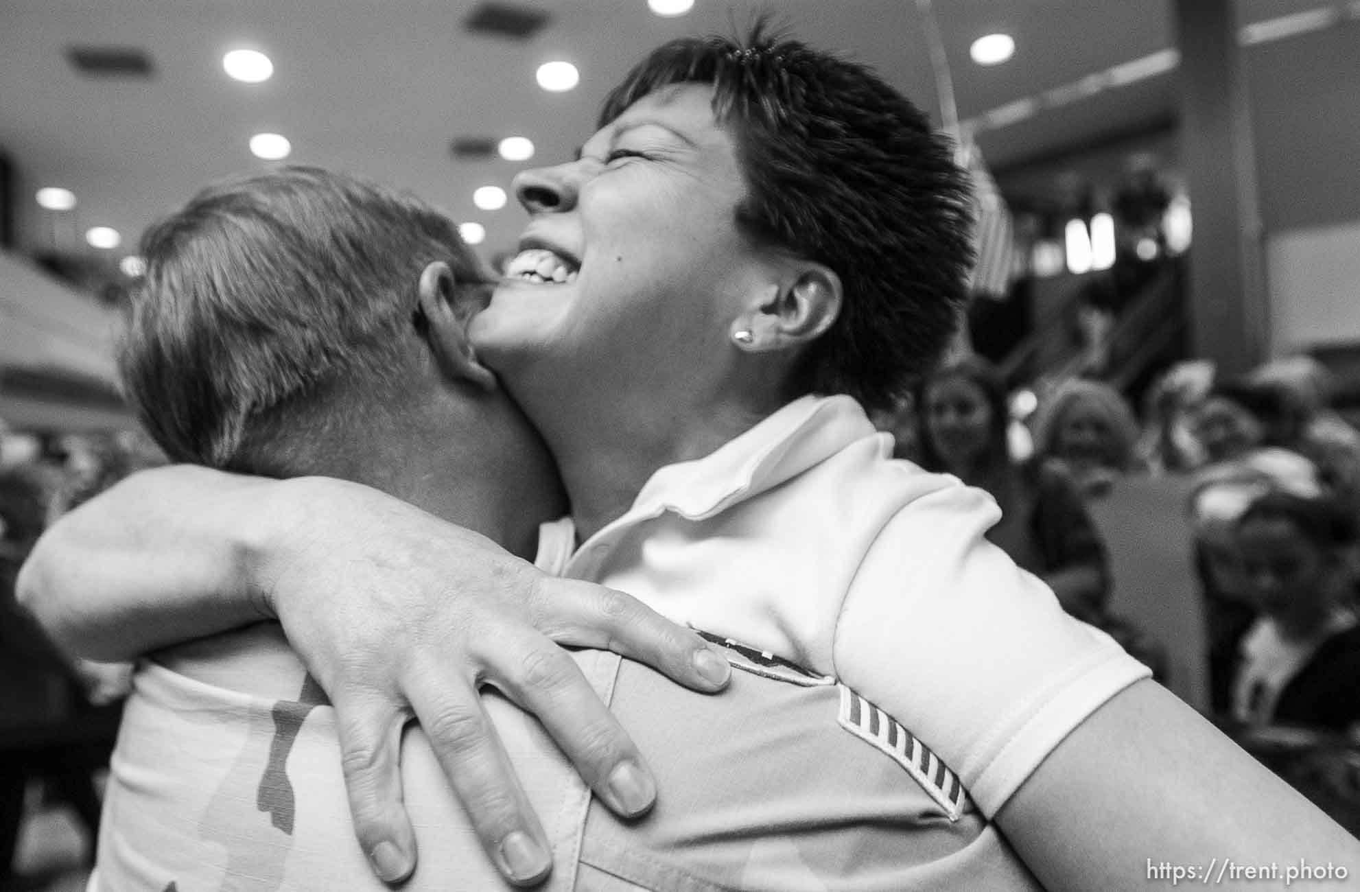 Members of the 141st Military Intelligence Battalion returned to Salt Lake City after serving in Afghanistan for 18 months. They were met by family and friends at the Salt Lake City Airport.
; 6.01.2005