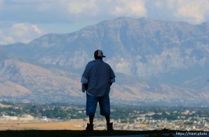 Cedric Webb of New Orleans takes in his last view of the Wasatch Mountains before boarding a bus to begin his trip to Nashville, Tennessee where he will reunite with family members he was split up from by the hurricane Katrina disaster. 