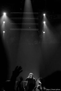 U2 performs at the Delta Center.