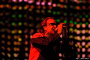 U2 performs at the Delta Center.